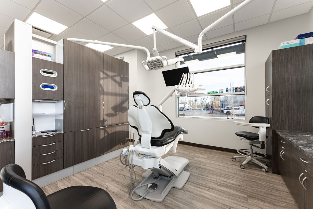 Modern dental treatment room with cabinetry and dental equipment, BCT Contractors renovation.