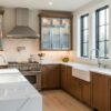Modern kitchen showcasing renovation costs with quartz countertops and custom cabinetry